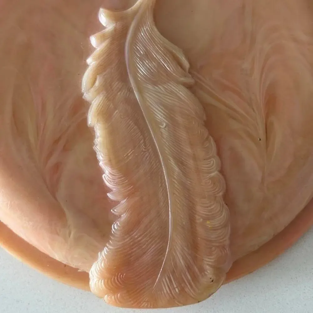Vintage marbled blush powder compact with carved feather motif